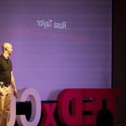 Ross Taylor on stage at a TED Talk