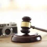 photo of judge's gavel and camera by Sangeun Shin