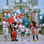 A family at Disney World in the 1990s