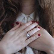 Woman crossing her hands over her chest