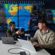 Graduate students Michael Klonowski, left, and Daniel Aguilar-Marsillach, right, work in the Raytheon Space & Intelligence Vision, Autonomy, and Decision Research (VADeR) at CU Boulder, which studies new methods for tracking and managing satellite traffic in space. (Credit: CU Boulder College of Engineering and Applied Science) 