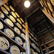 Barrels of bourbon stacked to the ceiling at Woodford Reserve distillery