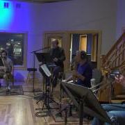 Students and faculty record arrangements at Might Fine Recording studio in Denver 