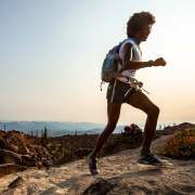 Peyton Thomas running on a trail